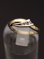 14 carat gold ring size 58 with 3 clear stones