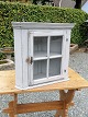 Small gray painted corner cabinet Front with glass door behind which shelves Sweden approx year ...