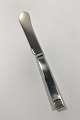 Evald Nielsen 
Silver No 33 
All silver 
Butter Knife 
Measures 16.3 
cm(6 27/64 in)