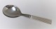 Georg Jensen. 
Bernadotte. 
Sterling (925). 
Serving spoon 
with steel. 
Length 19,5 cm. 
Produced ...