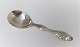Serving spoon 
with amber. 
Length 17.5 cm. 
Produced 1920.