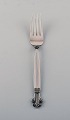 Johan Rohde for 
Georg Jensen. 
Acanthus lunch 
fork in 
sterling 
silver. Two 
pieces in ...