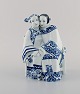 Vicken von Post-Börjesson (1886-1950) for Rörstrand. Rare porcelain figurine. 
Asian couple on bench. 1930s.
