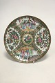 Chinese Canton 
(gold and 
green) plate. 
Palace scenery, 
birds and 
butterflies. 
Ca. 1850. Small 
...