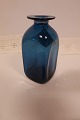 Vase from Kastrup Glasværk, Denmark
From The Capri Serie
Blue vase made of clear blue glass
Design: Jacob E. Bang (1899-1965)
Produced in Fyns Glasværk in 1961 (the produktion 
ends in 1973)
H: about 15cm
In a good condition