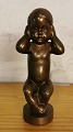 Bronze figure 
of child. Made 
by Svend 
Lindhart for 
Bing & Grondahl 
in porcelain, 
but here the 
...