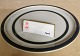 The plate in 
stoneware from 
Bing & Grondahl 
from the TEMA 
series model 
number 624. 
Appears in ...