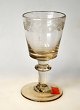 Rare wine glass 
with grindings. 
19th century. 
Clear glass 
mass. Slightly 
conical cup. 
With ...