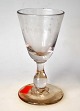 Rare wine 
glass, 19th 
century. Clear 
glass mass. 
Bowl with 
baluster stalk. 
H .: 10.7 cm.
On ...