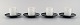 Tapio Wirkkala 
for Rosenthal. 
Four porcelain 
noire mocha 
cups with 
saucers in 
black and white 
...