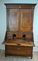 Danish empire 
chatol with 
cabinet in 
polished elm 
wood with 
marquetry, 
approx. 1800. 
Lower part ...