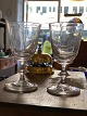 Old Berlinoirs 
small white 
wine glasses 
with smooth 
basin on stem 
with button. 
Lots of charm 
...