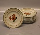 14 pices 
together DKK 
400
Cake plate 
15,5 cm  Royal 
Copenhagen 
Aluminia 
Faience 
Calendula ...