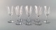 St. Louis, Belgium. Eight red wine glasses in mouth-blown crystal glasses. 1930 
/ 40s.
