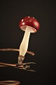 Old Christmas 
tree 
decorations in 
the form of a 
mushroom with a 
red hat and 
white dots in 
glass ...