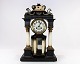 French 
fireplace clock 
of marble and 
bronze, and 
decorated with 
ornaments of 
mother of pearl 
...