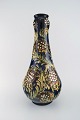 Kähler, HAK. 
Large vase in 
glazed 
stoneware. 
Flowers on blue 
background. 
1930 / 40s.
Measures: ...