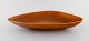 Gunnar Nylund 
for Nymølle. 
Large 
triangular dish 
in glazed 
ceramics. 
Beautiful glaze 
in light ...