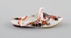 Antique Meissen slipper in hand-painted porcelain with floral motifs and  gold 
edge. Early 19th century.
