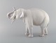 Axel Locher for Royal Copenhagen. Large and rare porcelain figure. Elephant. 
Model number 1373. Early 20th century.
