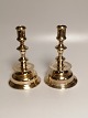 A pair of bell 
candlesticks 
made of brass 
ore at the end 
of the 18th 
century. Height 
19cm.