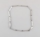 Gertrude Engel for Anton Michelsen. Modernist necklace in sterling silver. Dated 
1961.
