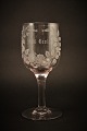 Old 
commemorative 
glass from 
Holmegaard 
glassworks with 
fine engraved 
floral 
decorations and 
...