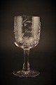 Old 
commemorative 
glass from 
Holmegaard 
glassworks with 
fine engraved 
floral 
decorations and 
...
