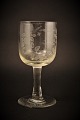 Old 
commemorative 
glass from 
Holmegaard 
glassworks with 
fine engraved 
floral 
decorations and 
...