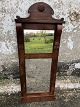 Mirror with 
frame in 
mahogany 
veneer. 101x40 
cm. minor 
damage to the 
veneer and 
age-related ...