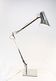 Table lamp of 
stainless steel 
and of italian 
design by Flos. 
The lamp is in 
great vintage 
...