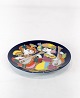 Plate called 
Oriental Night 
Music motif 2 
by Bjørn 
Wiinblad.
Dimensions: 
Dia: 15 cm.
