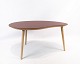 Coffee table 
with brown 
laminate top 
and legs of oak 
by Via 
Copenhagen. The 
table is in 
great ...