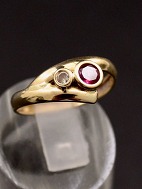 14 carat gold ring size 56 with ruby and clear stone