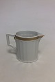 Royal 
Copenhagen Gold 
Fan Milk 
Creamer No. 
11542. 11.5 cm 
H. 1st Quality, 
in great 
condition