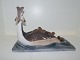 Large Bing & 
Grondahl 
figurine, grebe 
with chicks.
The factory 
mark tells, 
that this was 
...