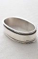 Georg Jensen 
sterling 
silver. Pyramid 
silver, vintage 
napkin ring no. 
22 Length 5.3 X 
3 cm. or 2 ...