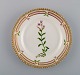 Royal Copenhagen Flora Danica side plate in hand-painted porcelain with flowers 
and gold decoration. Model number 20/3552.
