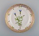 Royal Copenhagen Flora Danica salad plate in hand-painted porcelain with flowers 
and gold decoration. Model number 20/3573.
