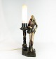 Table lamp of 
marble 
decorated with 
figure.
45.5 x 11.5 
cm.