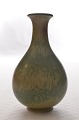 Vase from the 
1950s. 
Glaze in 
yellow, brown 
and skyblue 
tones, on 
stoneware vase. 
Height about 
...