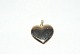 Elegant heart 
with pendant in 
8 carat gold
Height 34.81 
mm
Stamped HS
Checked by 
jeweler
the ...