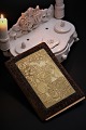 Fine, old 
poetry book 
from the year 
1894 with small 
handwritten 
poems. 18x12cm.