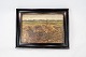 Oil painting 
with harvest 
motif and black 
frame.
40 x 31 cm.