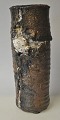 Danish potter 
(20th century): 
Vase. 
Stoneware. 
Brown and light 
glazed. 
Unclearly 
signed. H .: 
...
