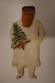 This old Christmas decoration is made of squeezed 
cotton wool and coloured scrap/cardboard
It has a fine old patina