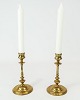A pair of 
candlesticks 
in brass and in 
great used 
condition from 
the 1920s.