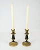 A set of 
candlesticks in 
brass with 
black metal and 
in great used 
condition from 
the ...