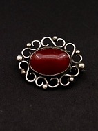 Sterling silver brooch 3.1 x 2.5 cm. with amber