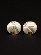 N E From sterling silver vintage ear studs